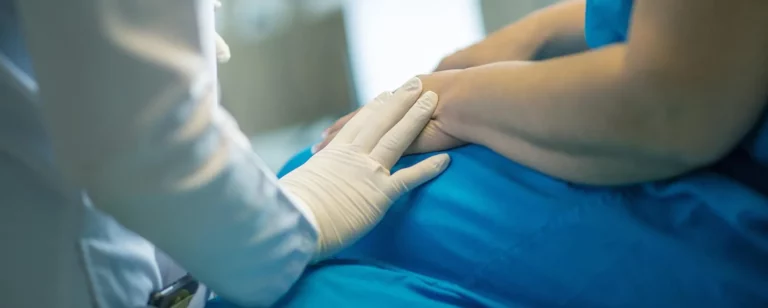 Nurse comforting patient